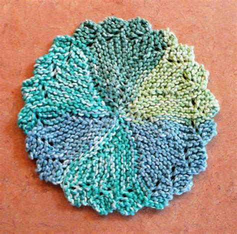 FREE PATTERN #11 - Knitlist Lacy Round Dishcloth | Dishcloth knitting patterns, Knitted ...