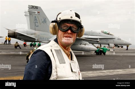 German Defence Minister Karl-Theodor zu Guttenberg stands on the flight ...