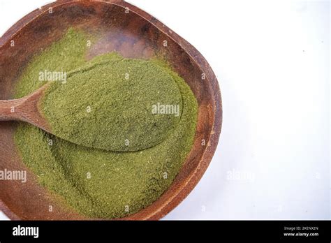 Kratom or Mitragyna speciosa powder isolated on white background top ...