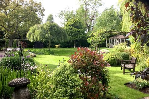 Peek inside this delightful thatched cottage with picture-perfect gardens in Oxfordshire ...