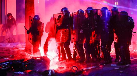 Paris protests: Police clash with protesters as violence flares at anti ...