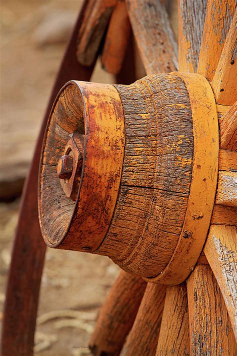 Yellow Wagon Wheel Hub Photograph by Phyllis Denton - Fine Art America