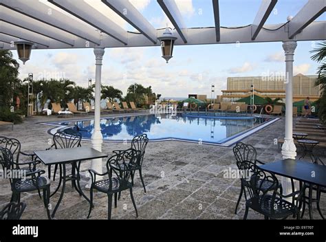 Pool on rooftop of hotel Stock Photo - Alamy