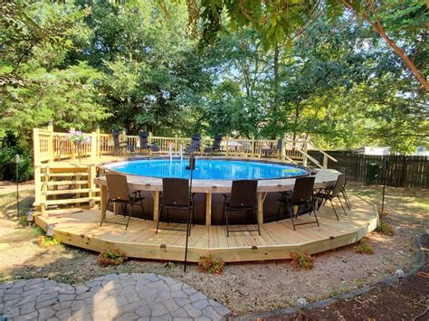 Above ground pool with deck and bar | Backyard pool landscaping, Pool ...