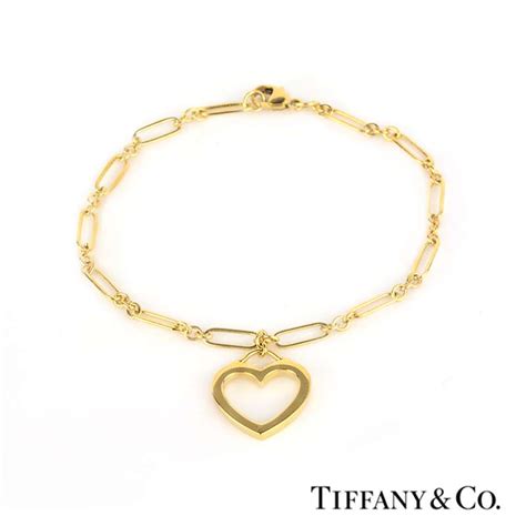 TIffany & Co. 18k Yellow Gold Heart Charm Bracelet | Rich Diamonds