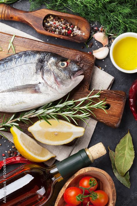 Raw fish cooking ingredients Stock Photo | Adobe Stock