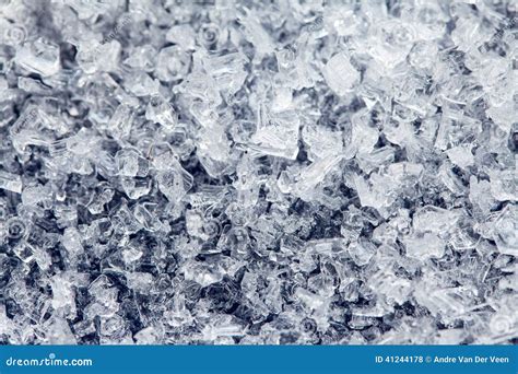 Ice Crystals of Frozen Water on a Dark Surface Stock Photo - Image of ...