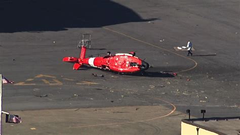 Two pilots suffer minor injuries after Coast Guard helicopter crash-lands at San Francisco ...