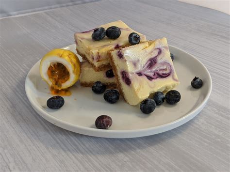 Passion Fruit & Blueberry Swirl Cheesecake Bars Recipe - Da Vine Hawaii