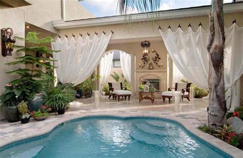 15 Relaxing and Dramatic Tropical Pool Designs | Home Design Lover