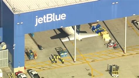 One JetBlue plane headed for Puerto Rico bumps into another in gate area at JFK Airport; no ...