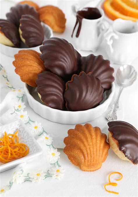 Chocolate Dipped Orange Madeleines - Sprinkle Bakes