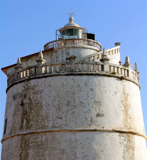 The Lighthouse at Fort Aguada, India Stock Photo - Image of coast ...