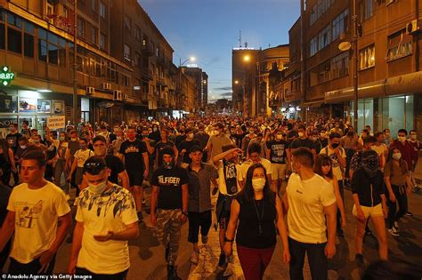 Police pelted with rocks by protesters and return fire with teargas in ...