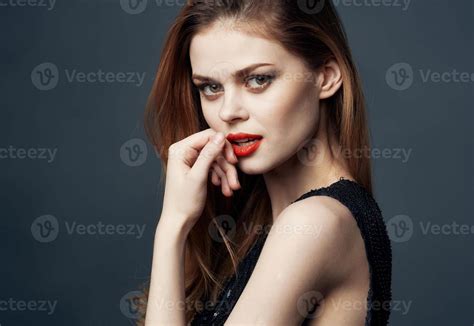 Portrait of beautiful woman with red lips makeup model gray background ...