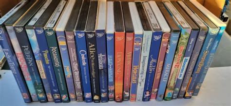 LOT OF 24 Disney DVD Disney Movies Lion King, Mulan, Hercules DVD NO ...