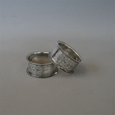 A pair of silver napkin rings