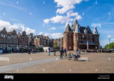 Nieuwmarkt (the New Market) and the Waag in Amsterdam, Netherlands on a summer day. Horizontal ...