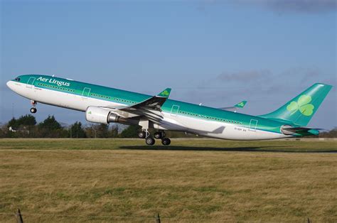 Aer Lingus Airbus A330-300 Just Before Touch Down Runway - Aircraft Wallpaper Flying Magazine