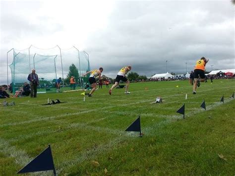 Stirling Highland Games - caber tossing in a beautiful setting