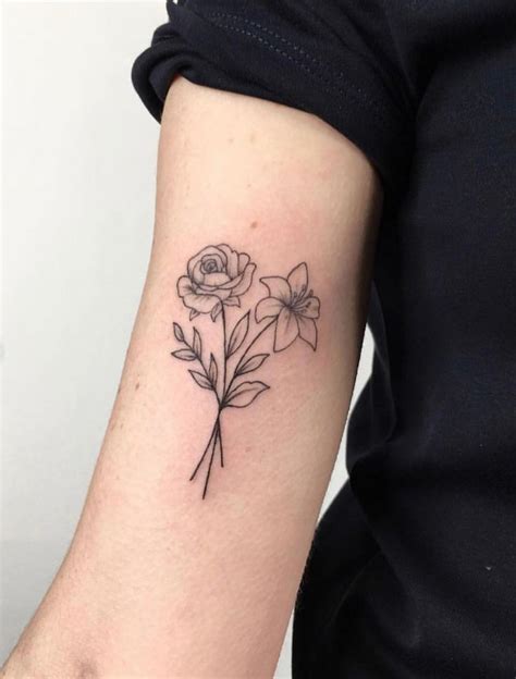 Two flowers intertwined as a tattoo done by @ellastormtattoo in London | www.otziapp.com ...