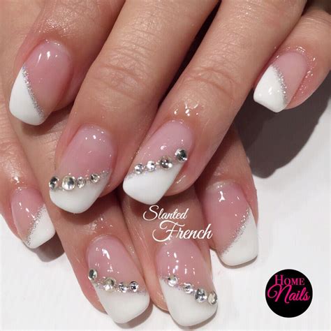 Slanted French with full set crystals. Gelish nail design perfect for a bride on her ROM or ...