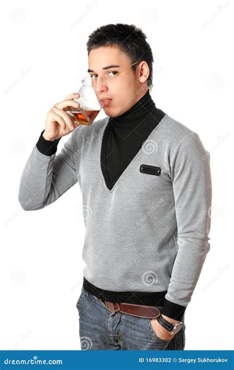 Young Man Drinking Whiskey from a Glass. Isolated Stock Photo - Image of individual, caucasian ...