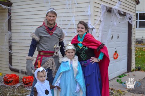 a family dressed up in costumes for halloween