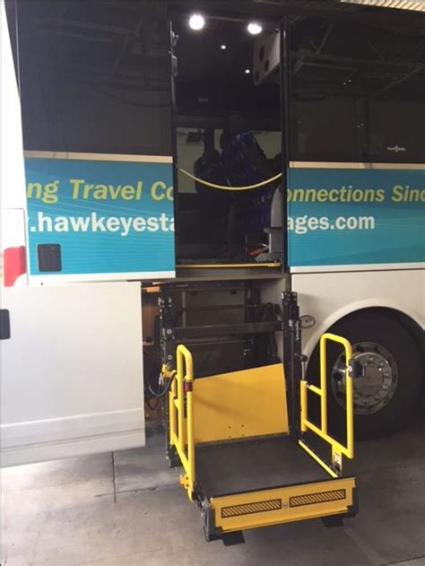 A wheelchair lift is installed on our newest VanHool coach ...