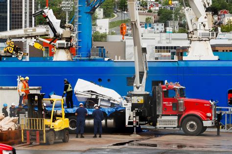 Debris from destroyed Titan submersible returns to land | PBS News