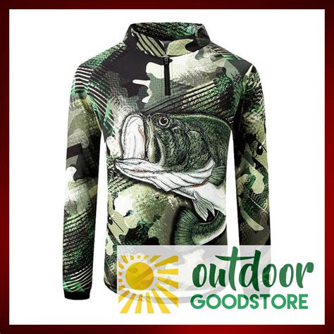 a green camo fishing shirt with the words outdoors goodstoree written on it