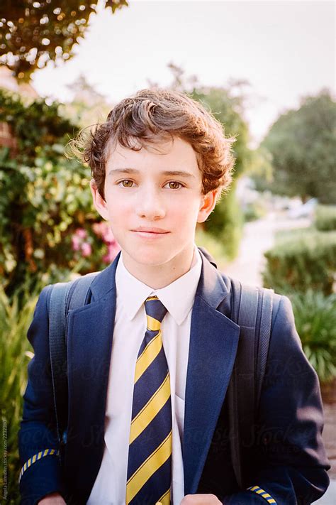 "Teenage Boy In A School Uniform With Backpack" by Stocksy Contributor ...