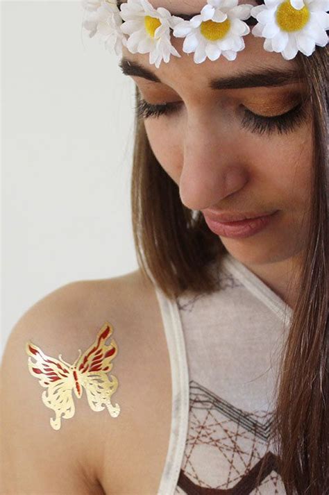 Gold Butterfly tattoo large | Butterfly tattoo, Gold butterfly, Tattoos