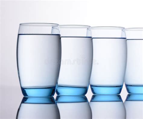 Clear Blue Water Glasses stock photo. Image of thirst - 44553766