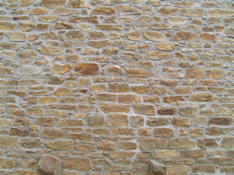 File:Old stone brick wall.jpg