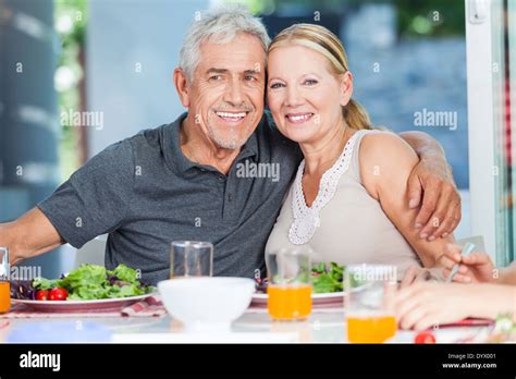 Family in big house Stock Photo - Alamy