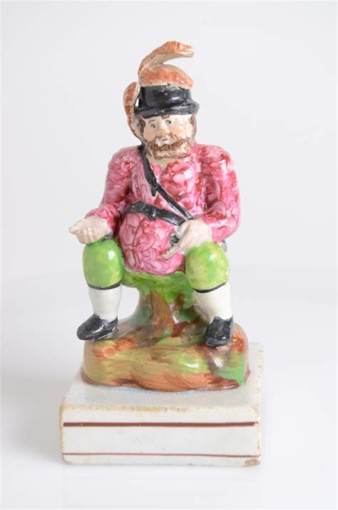 A Seated Pearlware Figure of Sir John Falstaff - Staffordshire Figures