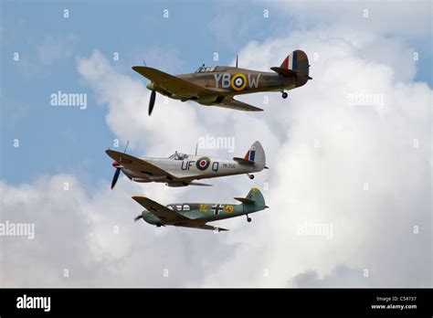 A classic World War 2 fighter formation - A Hawker Hurricane, VS Spitfire and Messerschmitt Me ...