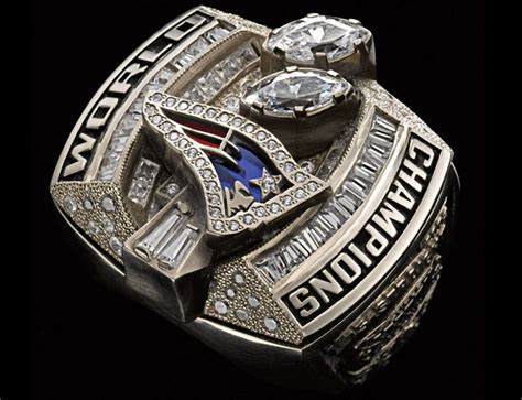 Texans' Romeo Crennel not ready to flash Super Bowl rings yet