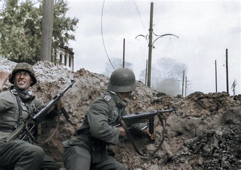 German soldiers of the 24th Panzer Division fighting near the southern station in Stalingrad ...