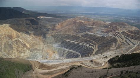 5.5K stock footage aerial video of an orbit around the Bingham Canyon ...