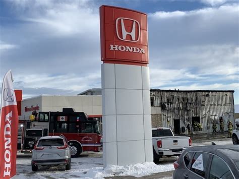 Investigators search for cause of fire at Edson Honda dealership | CBC News