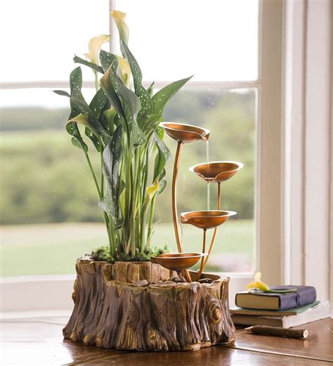 Beautiful sights and sounds of nature come together in this delightful Tabletop Fountain with ...