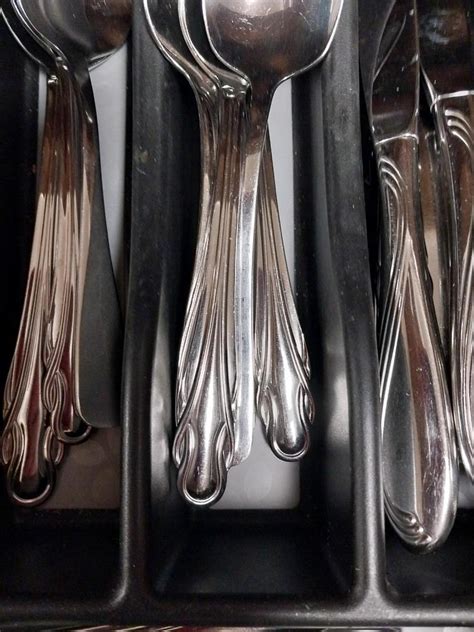 SET OF ONEIDA SILVERWARE AND KITCHEN UTENSILS | EstateSales.org