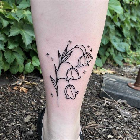 Lily of the valley tattoo on the calf - Tattoogrid.net