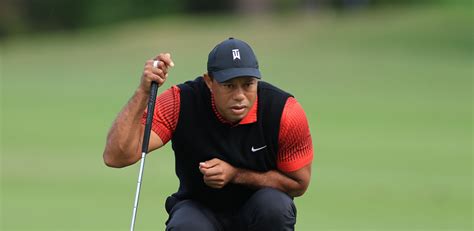 What brand of clothes does Tiger Woods wear?