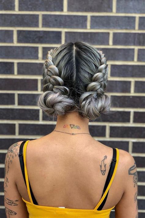 get ready for festival season with this boho braided updo! double dutch braids + space buns are ...