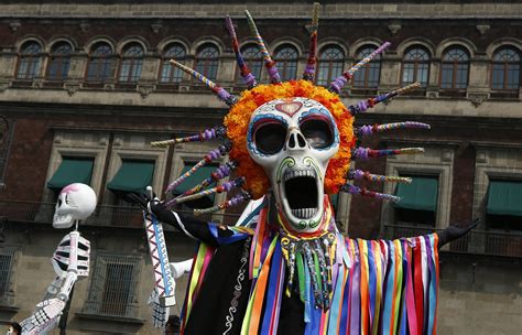 Day of the Dead parade hits Mexico City as holiday expands