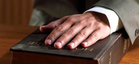 1-hand-on-bible – Inter-State Investigative Services | Tucson Private Investigators