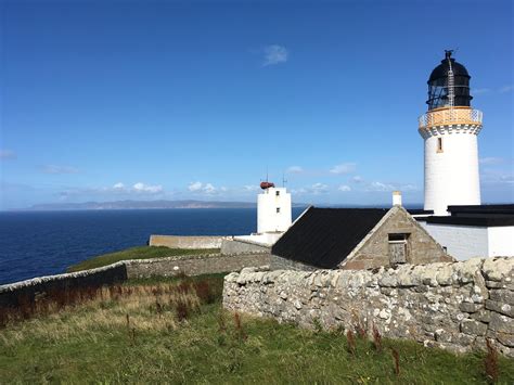 Dunnet Head Lighthouse, with Orkney in the background. : r/Scotland